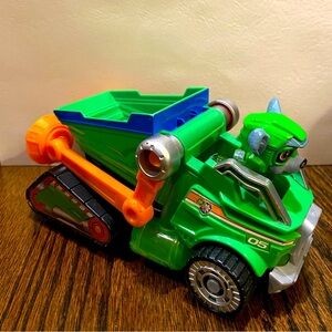 (3) Paw Patrol Rocky toys. Figurine, monster truck, and mighty paw cars.